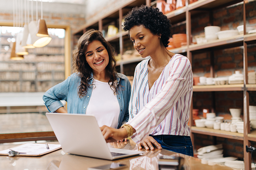 Two business owners in their store